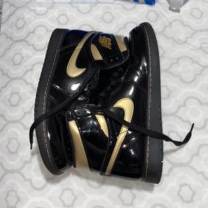 Gold and black air jordans, great condition.